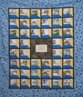 Finished attic window quilt with light houses made by Jean